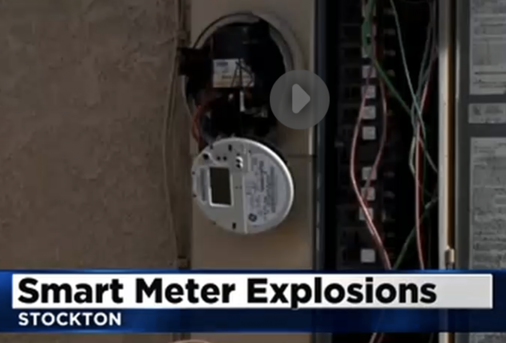 A smart meter face is left dangling in Stockton after numerous meters explode or catch of fire after a surge.